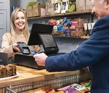 Payment by card in grocery store